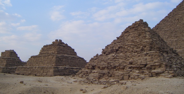 Some of the older small pyramids, including a step one.