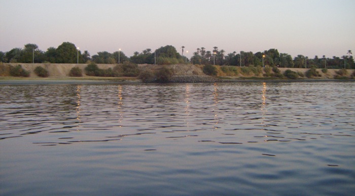 The green banks, and calm wind towards the end of our first day sailing down the Nile on a felucca.