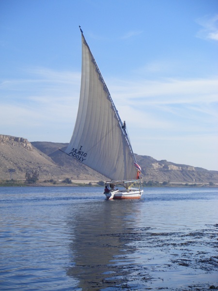 Another felucca without guests on returning downwind, but upstream to Aswan. We were moored to the eastern bank eating lunch at the time.