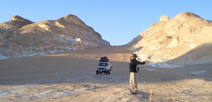 Stretching and soaking up the sun as we headed down into the White Desert. Why are all the deserts that I've been to absolutely freezing?