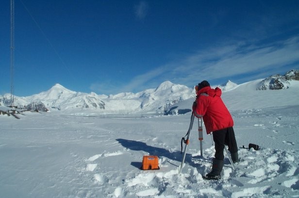 Me surveying the straightness of one of my science masts.