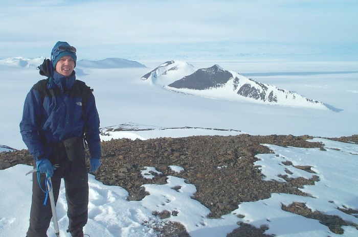 Me on top of Drune at Fossil Bluff. Georgian Cliffs are in the background.