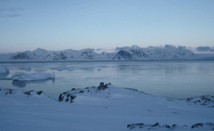 The view west to the Antarctic Peninsula from the GATF hut late in the winter. A recent storm has cleared the sea ice and the sea is beginning to freeze again close in to Rothera.