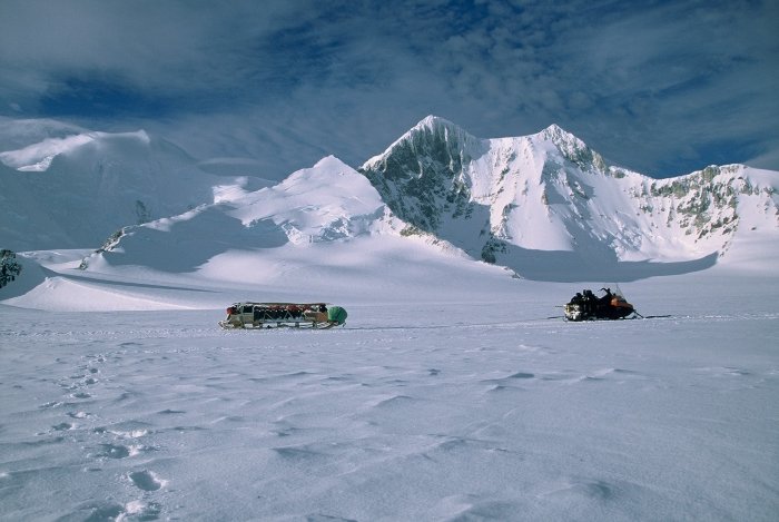 My skidoo and sledge in front of mountains on Adelaide Island during a winter trip.