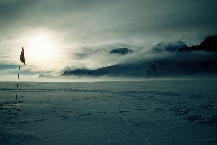 Mountains on the north end Adelaide Island and a flag marking the route seen during my first winter trip at Rothera.