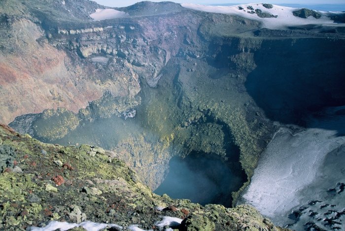 Gases coming out of the crater of the volcano. It was very quiet when we were there, but on the snow all around the volcano is ash and small rocks that often come out of it.