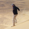Running down a dune in the western dessert.