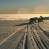 A skidoo and sledge overlooking the cloud covering Carvajal and the north-eastern tip of Adelaide Island.