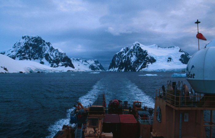The Ernest Shackleton emerging from the Lemaire Channel on the Antarctic Peninsula.